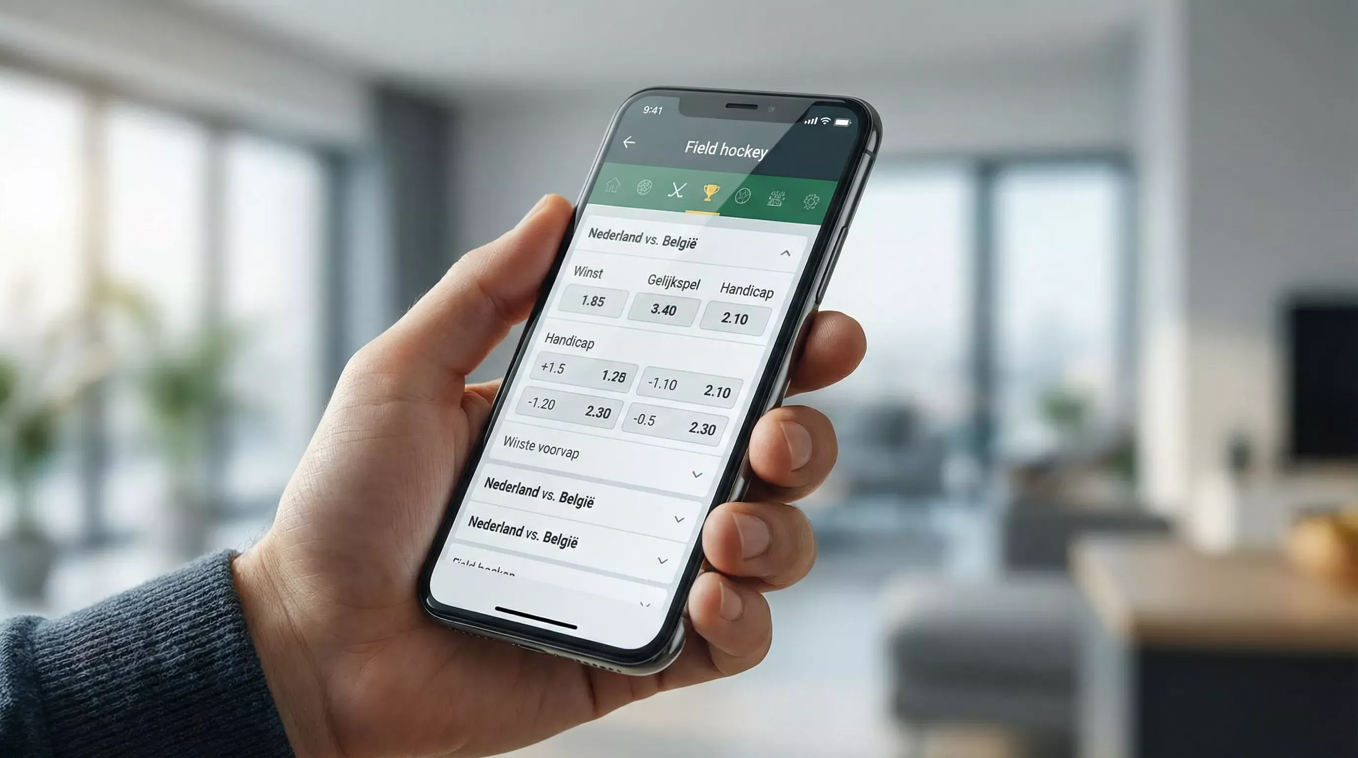 Mobiele telefoon met sportweddenschappen interface voor veldhockey